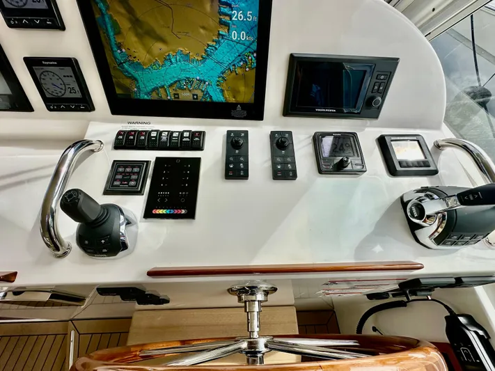 Southern Cross Yacht Photos Pics 2017 MJM 50z yacht helm with navigation screens and controls.