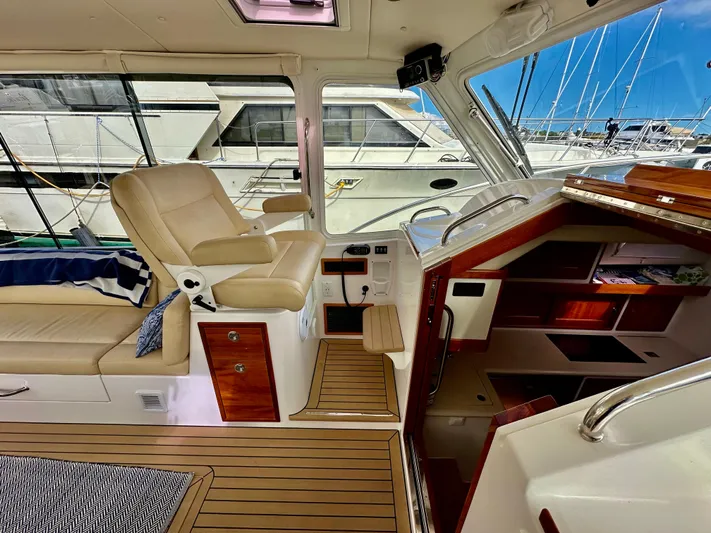 Southern Cross Yacht Photos Pics Luxurious 2017 MJM 50z yacht interior with leather seating and wooden accents.