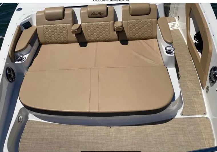 Hanamahina Yacht Photos Pics 2019 Sea Ray Sundancer 320 boat seating area with beige upholstery.
