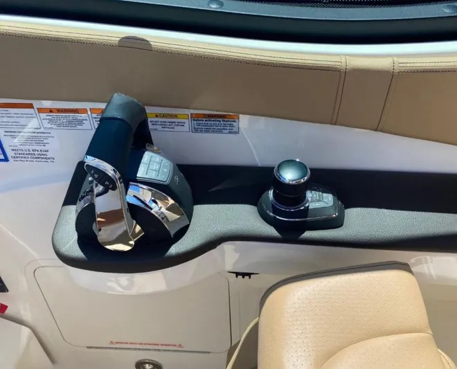 Hanamahina Yacht Photos Pics 2019 Sea Ray Sundancer 320 throttle and joystick controls in cockpit.