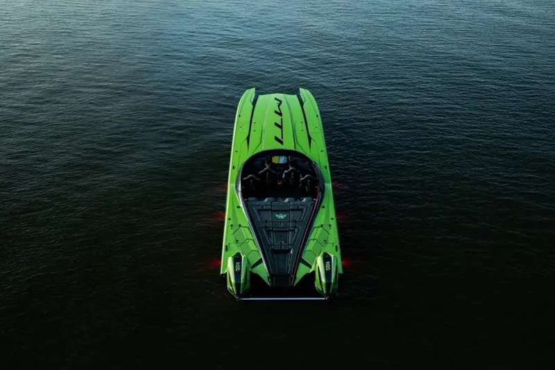 Yacht Photos Pics Green MTI 440X powerboat on water, 2025 model, aerial view.