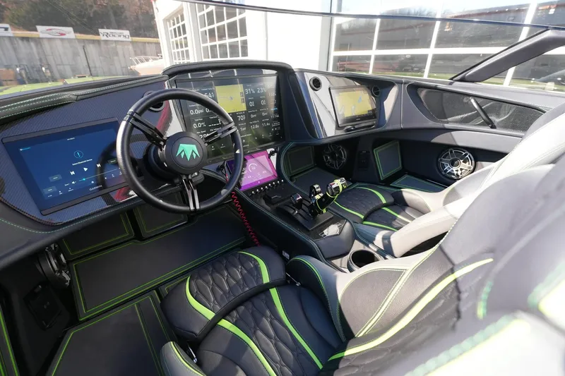  Yacht Photos Pics Interior of 2025 MTI 440X boat with advanced digital dashboard and luxurious seating.