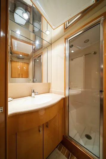 Big Boyd Yacht Photos Pics 2003 Hatteras 54 Convertible yacht bathroom with shower and vanity.