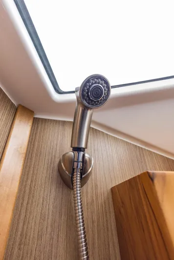  Yacht Photos Pics Showerhead in Solara S-310 CW yacht, 2025 model, with wood paneling.