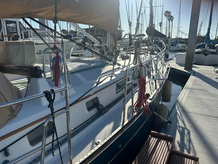 Joy Yacht Photos Pics Sailboat docked at marina, Passport Royal 43, 1999 model, sunny day.