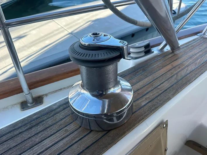 Joy Yacht Photos Pics Sailboat winch on teak deck of 1999 Passport Royal 43 yacht.