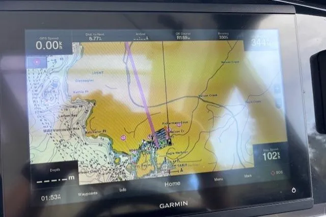  Yacht Photos Pics Garmin navigation display on 2021 Jeanneau NC Sport 895 boat, showing nautical map and route.