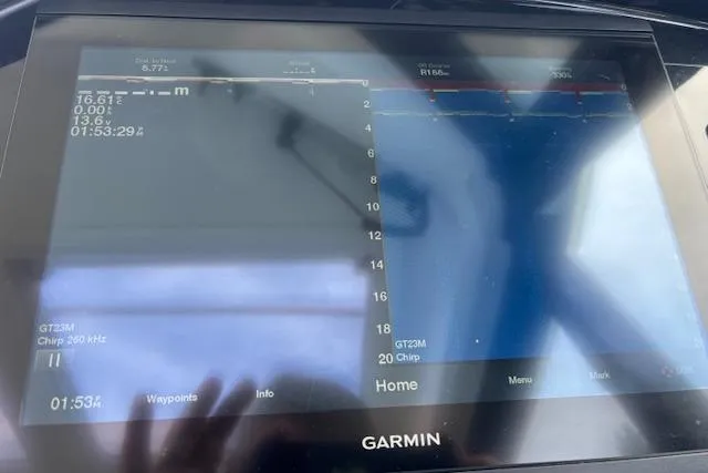  Yacht Photos Pics Garmin marine display on 2021 Jeanneau NC Sport 895, showing navigation and sonar data.