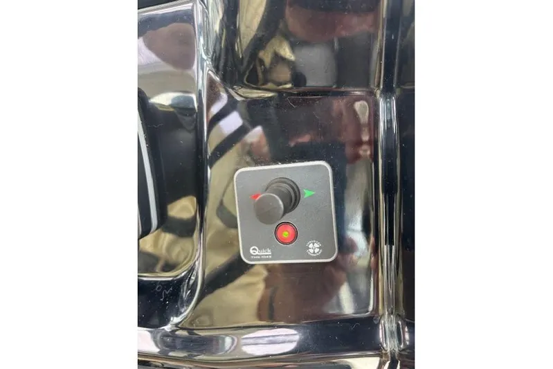  Yacht Photos Pics Control panel on 2021 Jeanneau NC Sport 895 boat, featuring joystick and indicator lights.