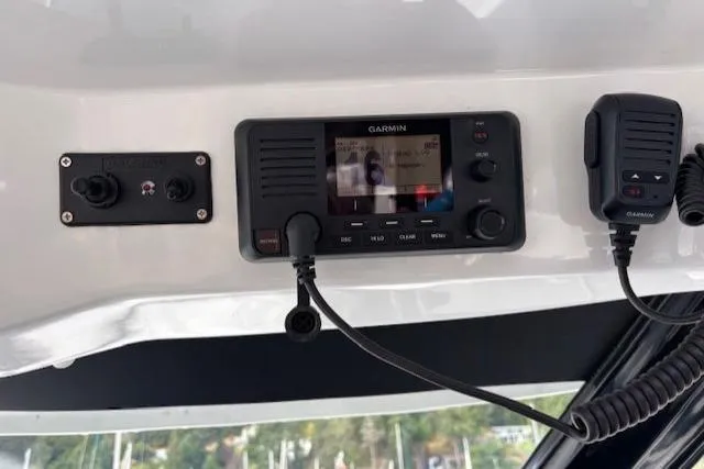  Yacht Photos Pics Garmin marine radio system on 2021 Jeanneau NC Sport 895 boat dashboard.