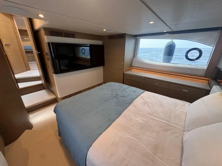  Yacht Photos Pics Luxurious interior of 2024 Princess V55 yacht with ocean view and modern amenities.