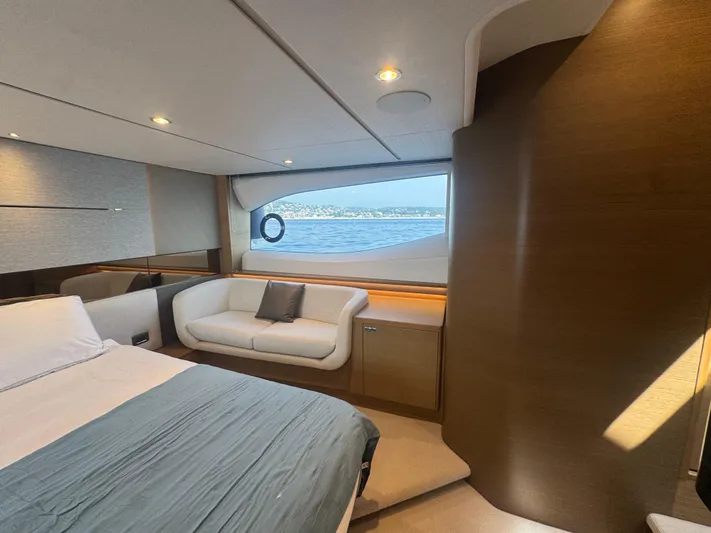  Yacht Photos Pics Luxurious interior of 2024 Princess V55 yacht with elegant furnishings and sea view.