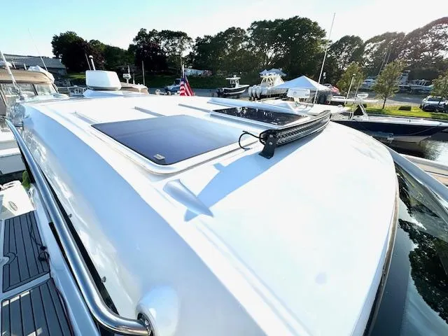 Three Beaches Yacht Photos Pics 2020 Four Winns Vista 355 Coupe OB boat with sleek design and rooftop features.