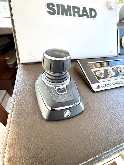 Three Beaches Yacht Photos Pics Joystick control on Four Winns Vista 355 Coupe OB, 2020 model, with Simrad navigation system.