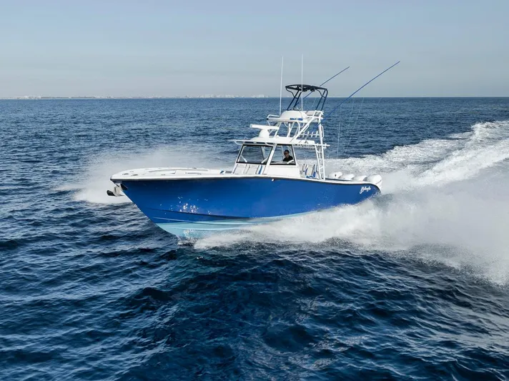  Yacht Photos Pics 2020 Yellowfin 42 Offshore boat cruising on open ocean waters.