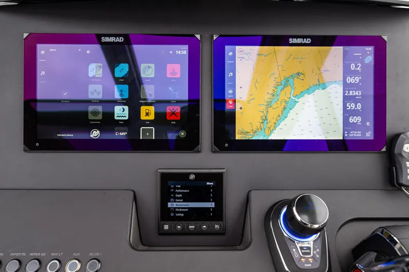 #41 Trade In Yacht Photos Pics Dashboard of 2022 Nimbus C11 with dual Simrad navigation screens.