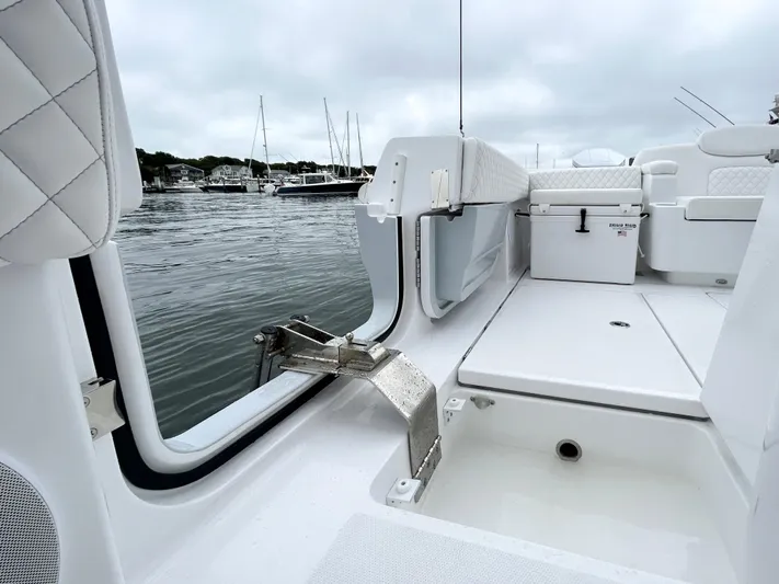  Yacht Photos Pics 2025 HCB 48 Campeon boat interior with open deck, near marina.