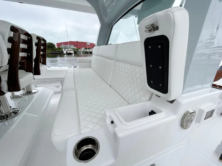  Yacht Photos Pics Luxurious seating on 2025 HCB 48 Campeon boat with quilted upholstery and sleek design.
