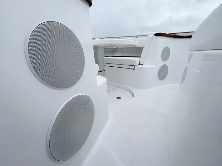  Yacht Photos Pics 2025 HCB 48 Campeon boat interior with sleek white seating and speaker system.
