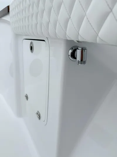  Yacht Photos Pics 2025 HCB 48 Campeon boat interior detail with quilted upholstery and chrome fixture.