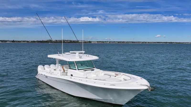  Yacht Photos Pics 2025 HCB 48 Campeon boat on open water under blue sky.