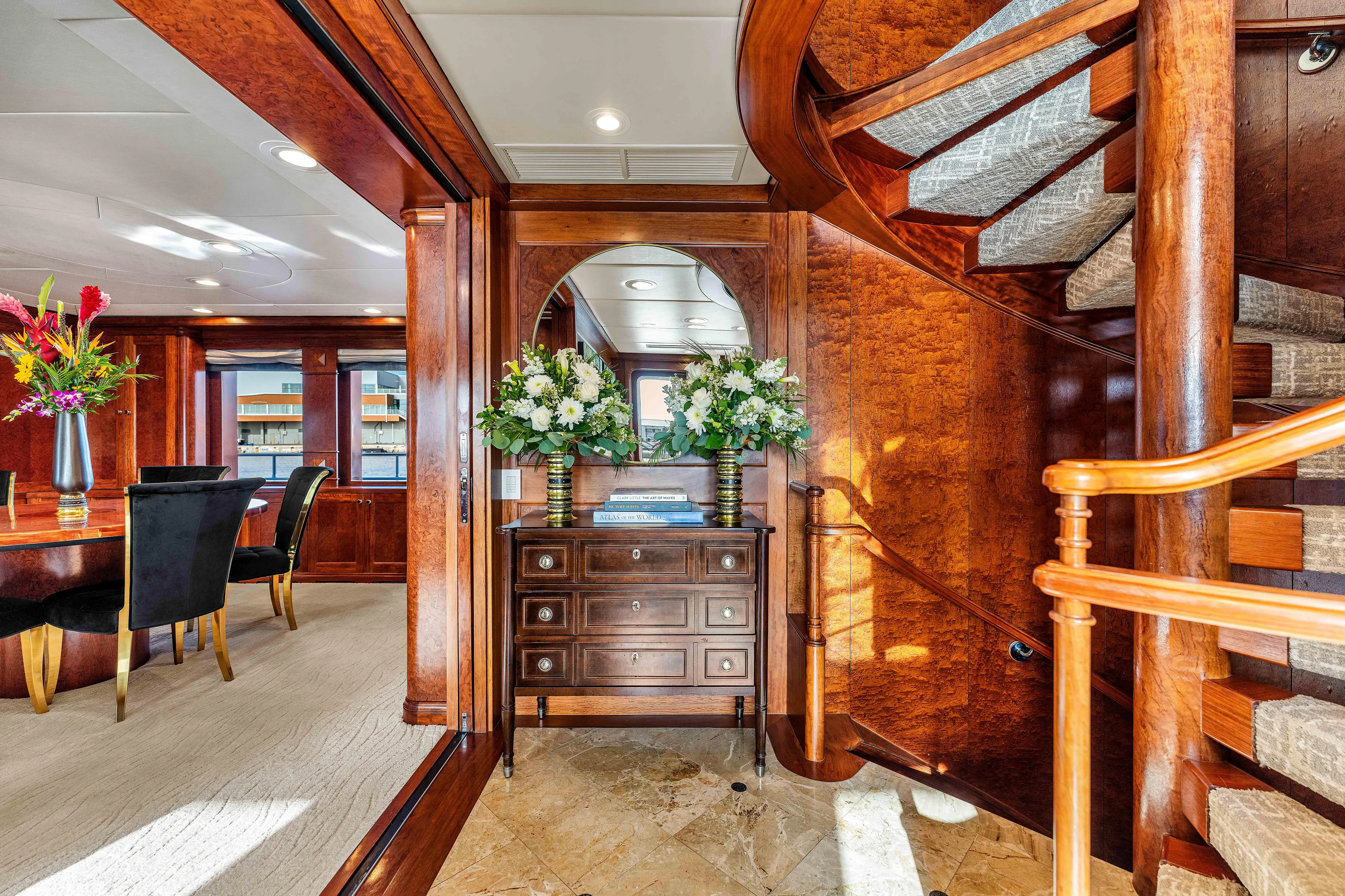 Star Diamond Yacht Photos Pics Luxurious 1998 Admiral Pilothouse interior with elegant wood staircase and floral decor.
