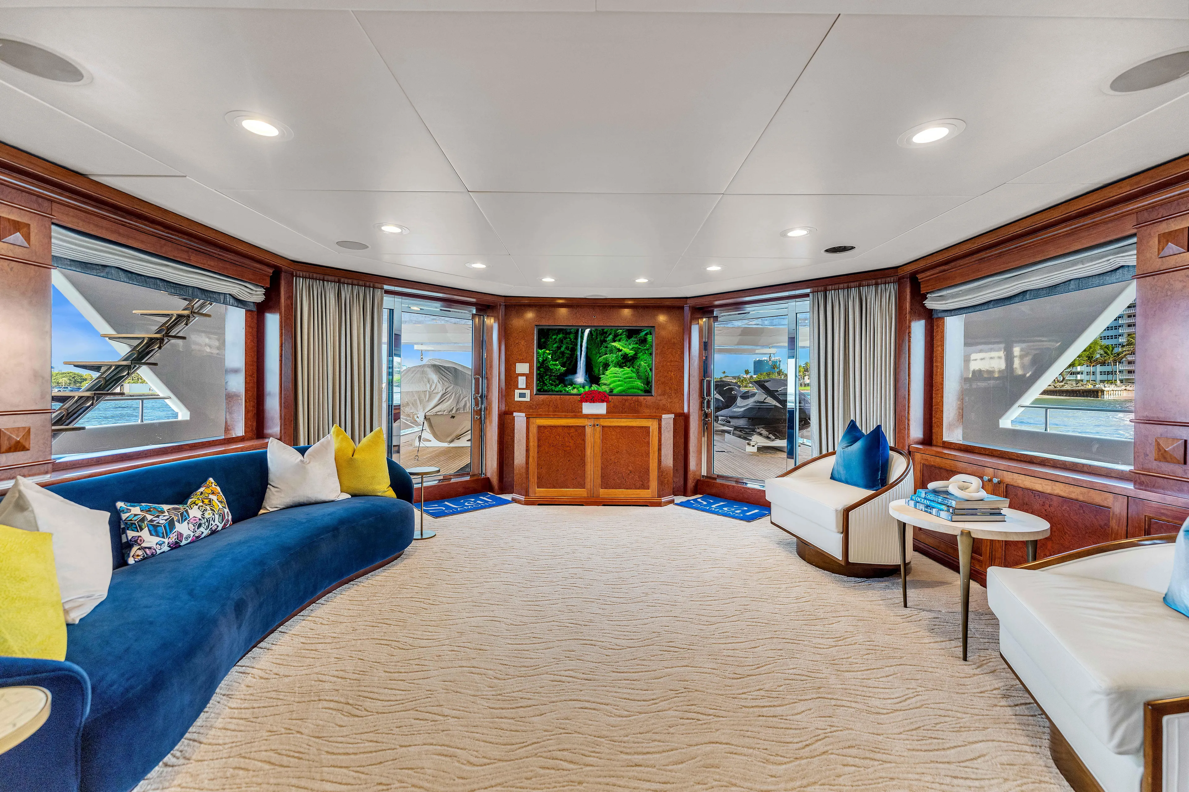 Star Diamond Yacht Photos Pics Luxurious 1998 Admiral Pilothouse yacht interior with elegant seating and large windows.
