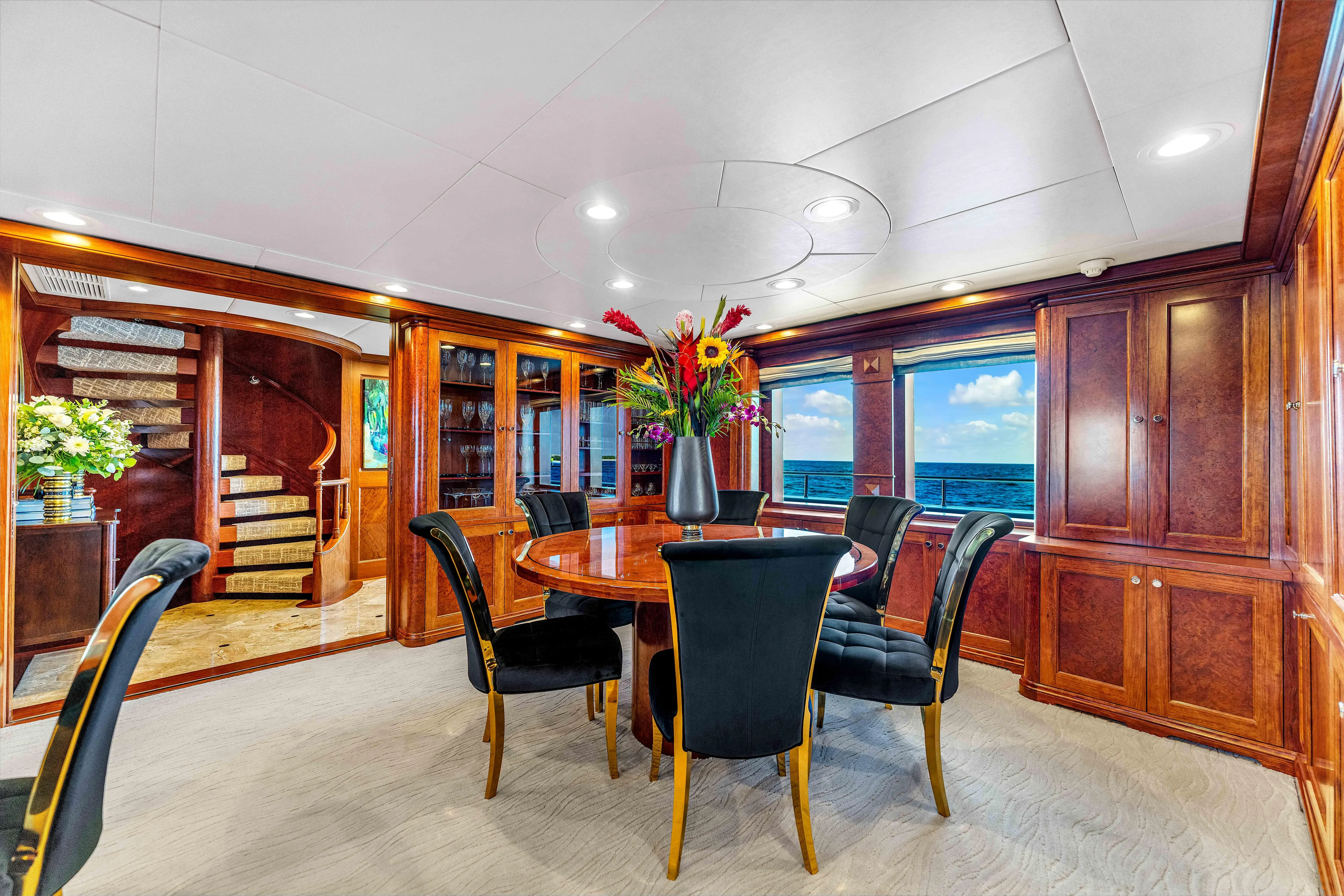 Star Diamond Yacht Photos Pics Luxurious 1998 Admiral Pilothouse yacht interior with elegant dining area and ocean view.