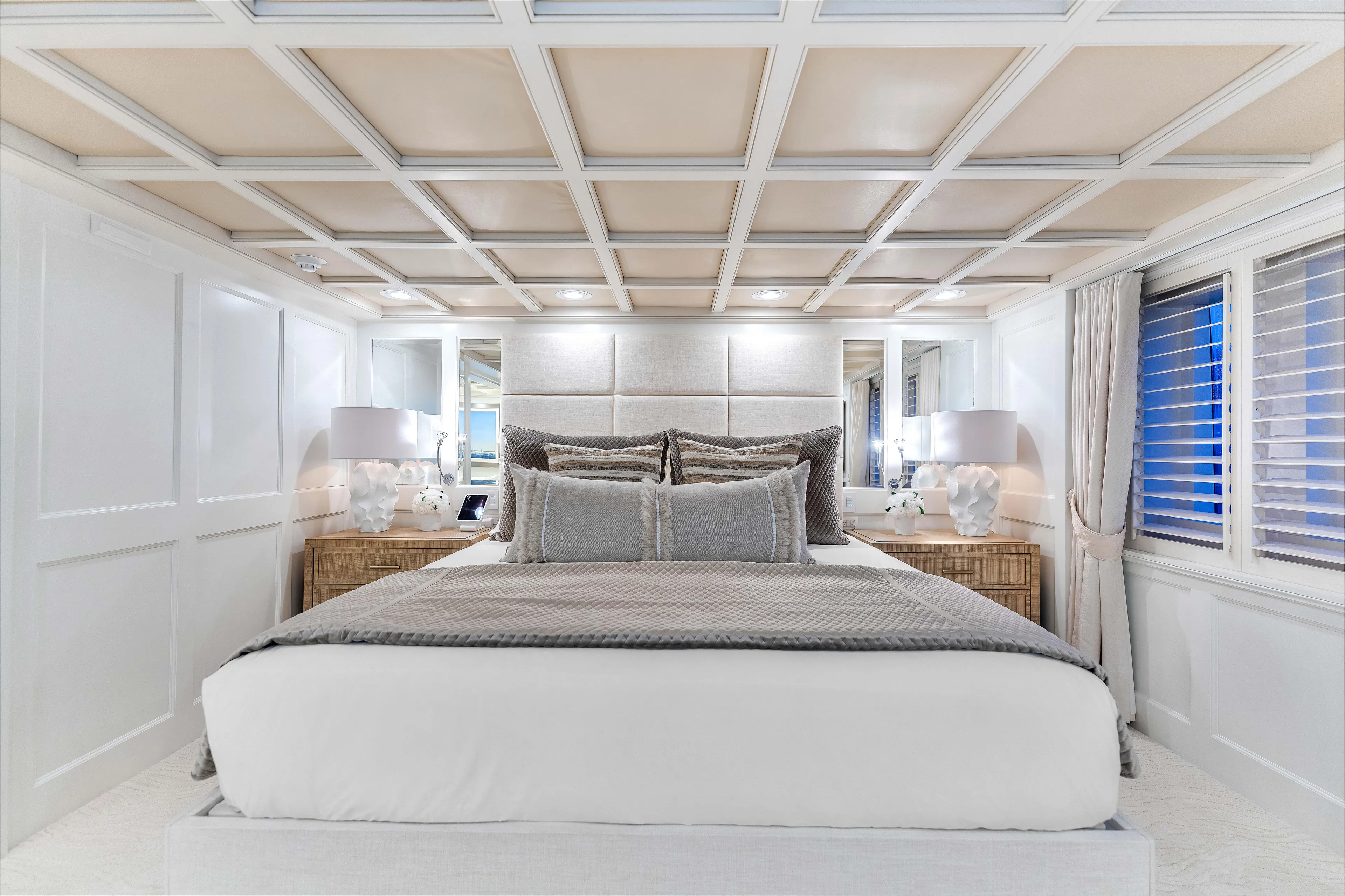 Star Diamond Yacht Photos Pics Luxurious bedroom interior on 1998 Admiral Pilothouse yacht, featuring elegant decor and ambient lighting.