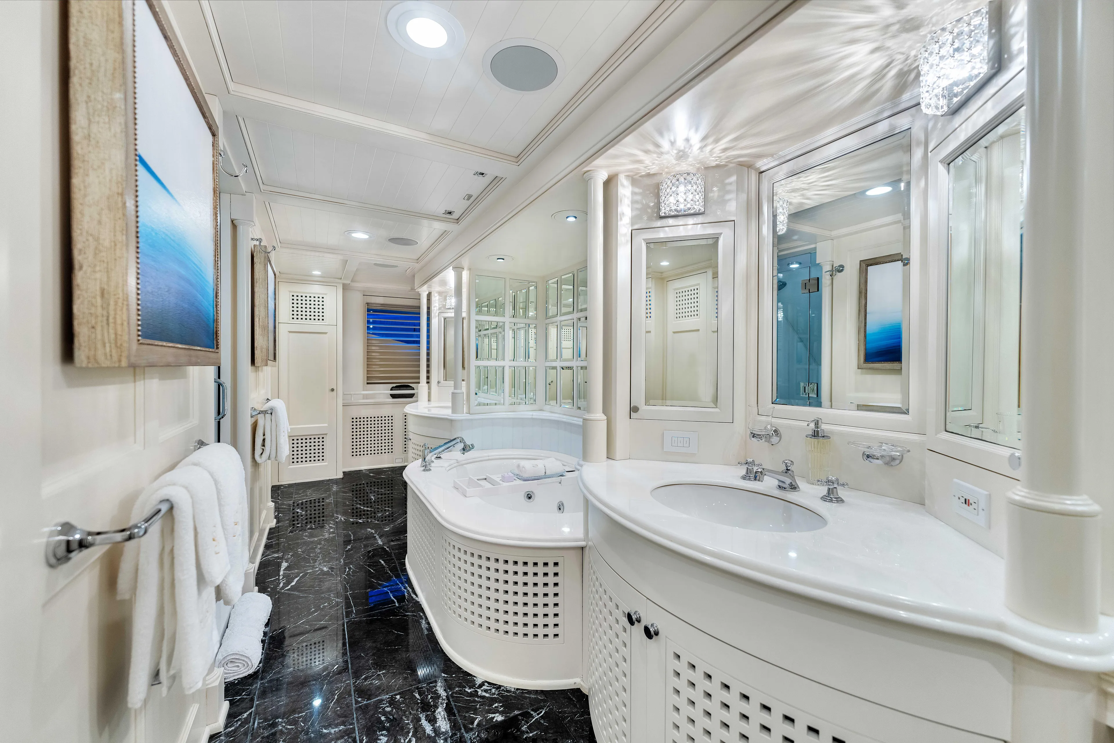 Star Diamond Yacht Photos Pics Luxurious yacht bathroom with elegant fixtures, marble floor, and modern design, Admiral Pilothouse 1998.