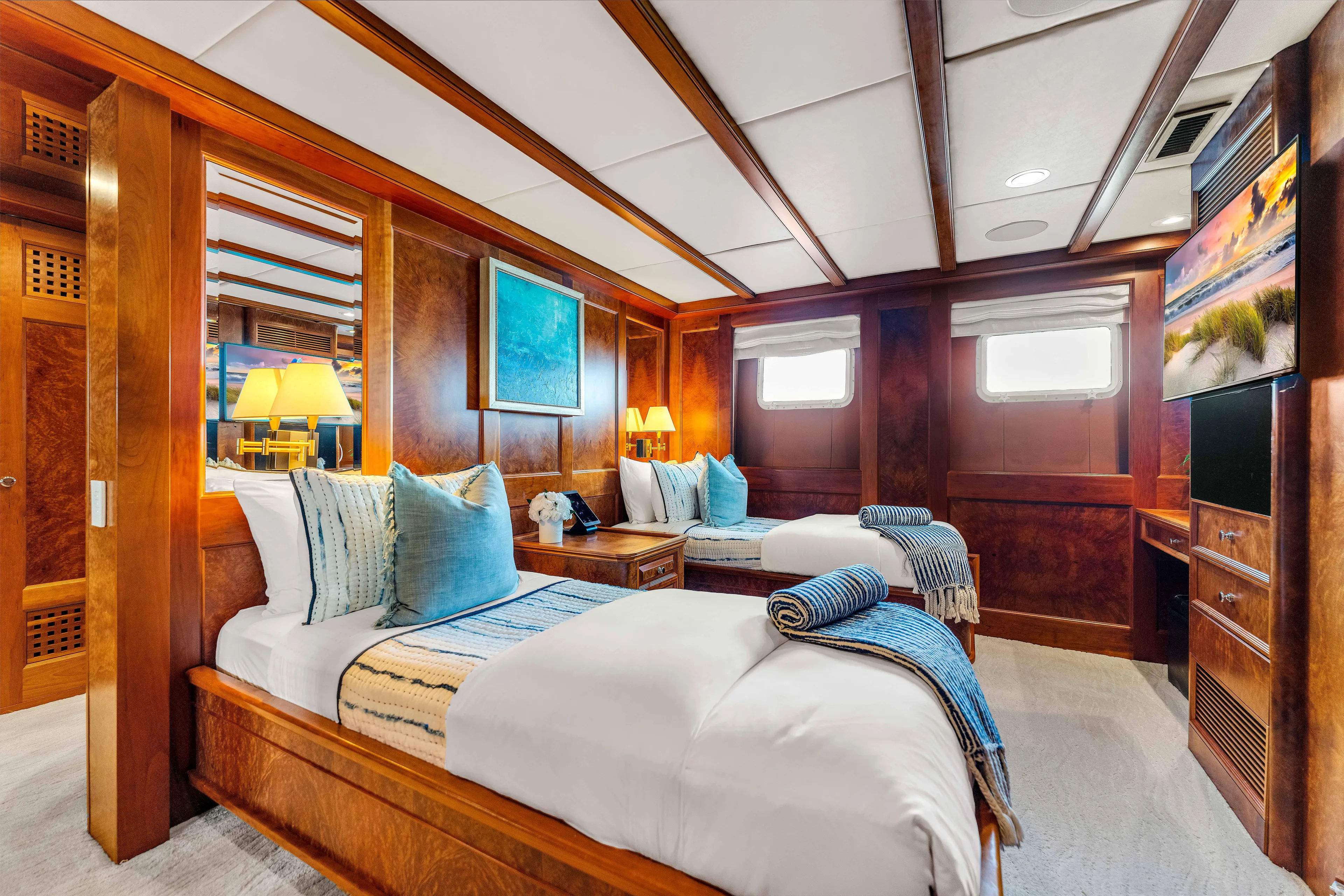 Star Diamond Yacht Photos Pics Luxurious 1998 Admiral Pilothouse yacht cabin with twin beds, elegant wood paneling, and nautical decor.