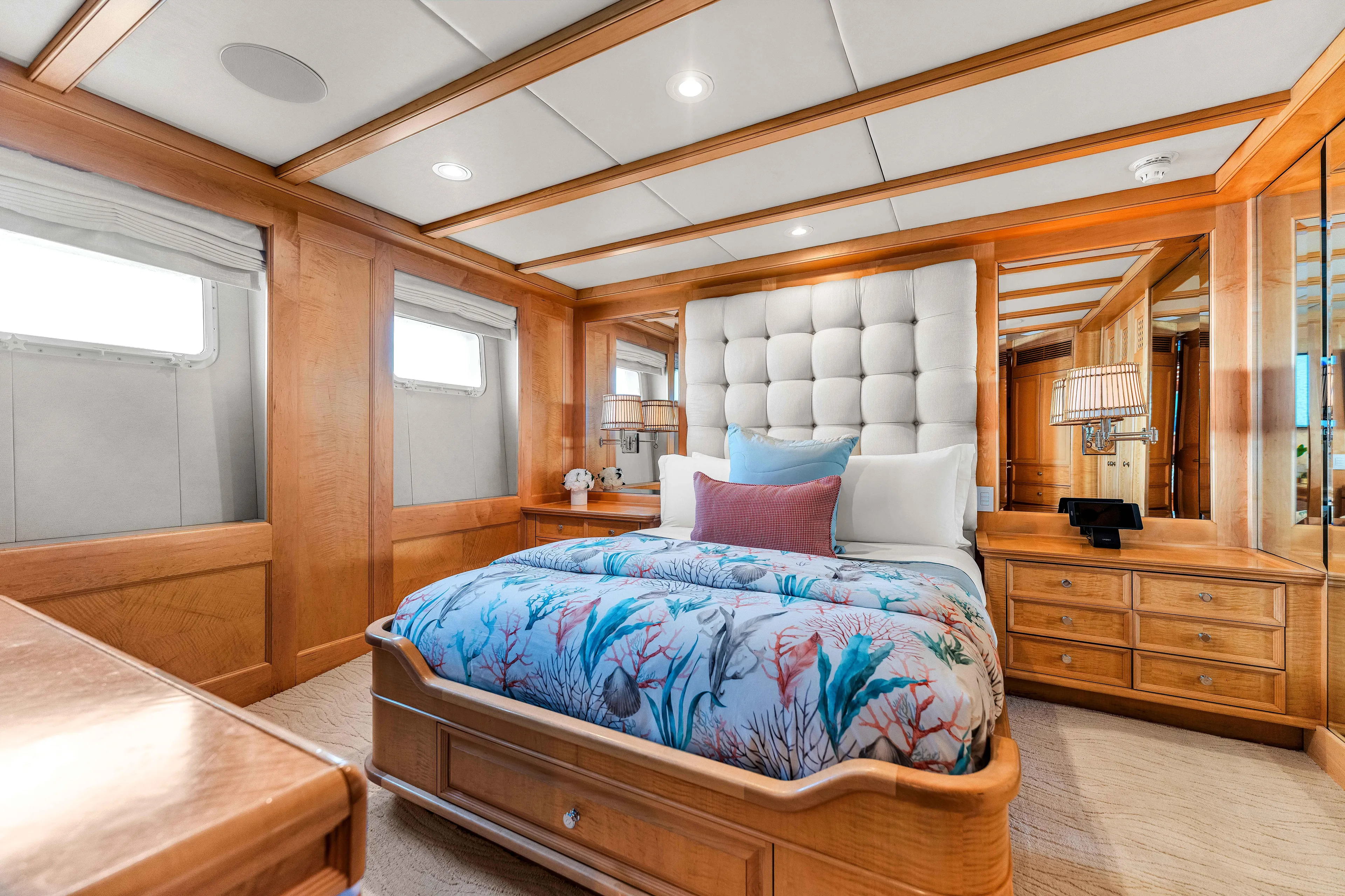 Star Diamond Yacht Photos Pics Luxurious 1998 Admiral Pilothouse yacht bedroom with elegant wood paneling and plush bedding.