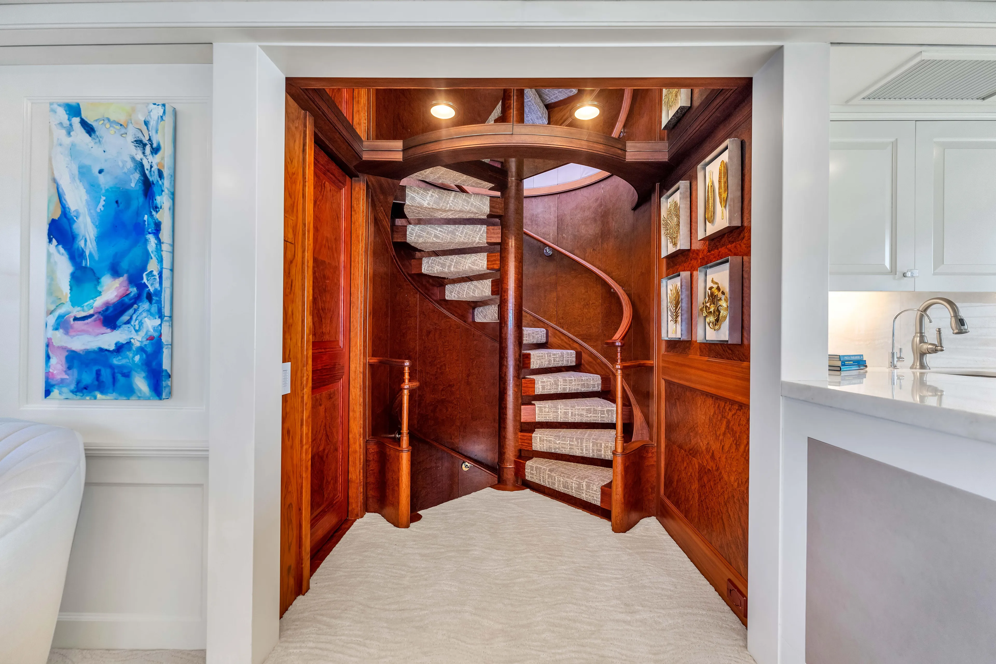 Star Diamond Yacht Photos Pics Luxurious wooden spiral staircase in 1998 Admiral Pilothouse yacht interior.