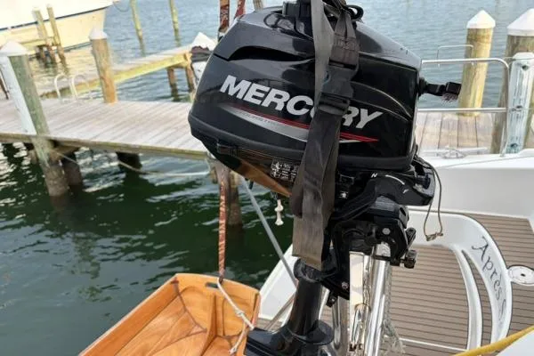 Apres Sea Yacht Photos Pics Mercury outboard motor on Lagoon 420 catamaran, docked by the water, 2008 model.