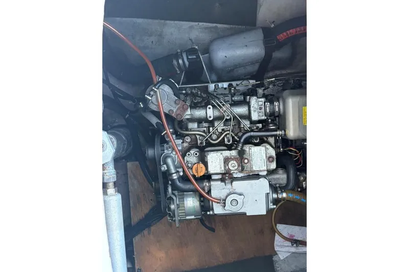 Apres Sea Yacht Photos Pics Engine of a 2008 Lagoon 420 catamaran, showcasing intricate mechanical components.