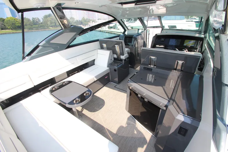  Yacht Photos Pics Luxurious interior of a 2018 Cobalt A36 boat with modern seating and sleek design.