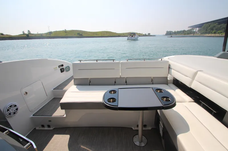  Yacht Photos Pics Luxurious seating area on a 2018 Cobalt A36 boat with scenic water view.