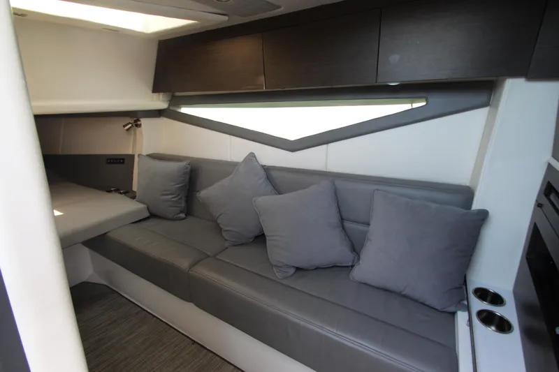  Yacht Photos Pics Interior of 2018 Cobalt A36 boat with gray seating and cushions.