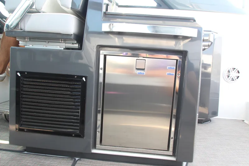  Yacht Photos Pics 2018 Cobalt A36 boat interior with stainless steel refrigerator and seating.