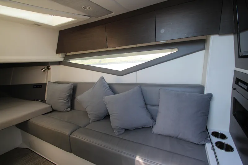  Yacht Photos Pics Interior of 2018 Cobalt A36 boat with modern gray seating and cushions.