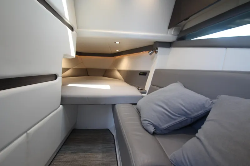  Yacht Photos Pics Luxurious interior cabin of 2018 Cobalt A36 boat with plush seating and modern design.