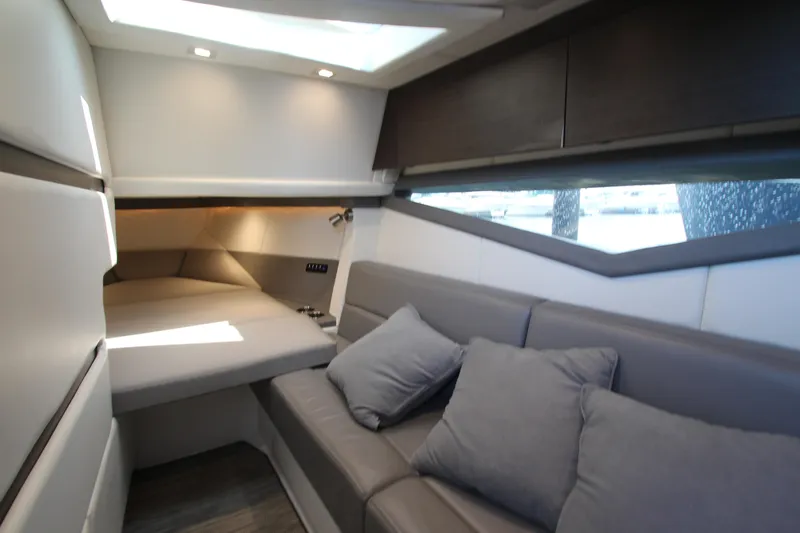  Yacht Photos Pics Luxurious interior of 2018 Cobalt A36 yacht with modern seating and ambient lighting.