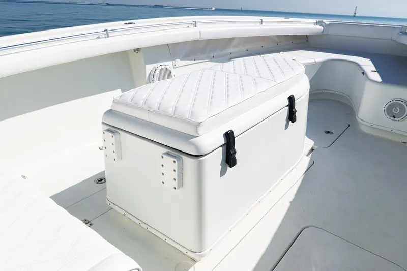  Yacht Photos Pics 2014 Yellowfin 36 Offshore boat interior with cushioned seating and storage.