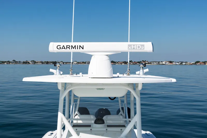  Yacht Photos Pics 2014 Yellowfin 36 Offshore boat with Garmin xHD2 radar on calm water.