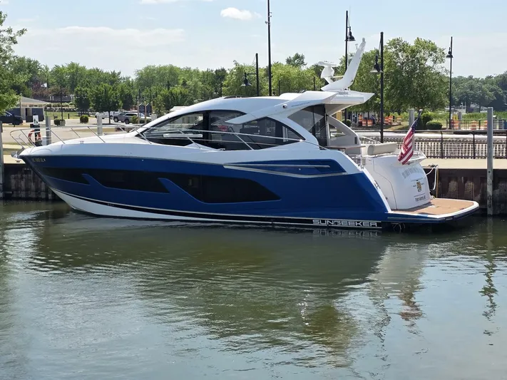  Yacht Photos Pics 2019 Sunseeker Predator 50 yacht docked, featuring sleek design and modern amenities.