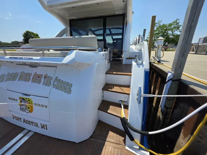  Yacht Photos Pics 2019 Sunseeker Predator 50 yacht docked, rear view with stairs, Port Austin, MI.