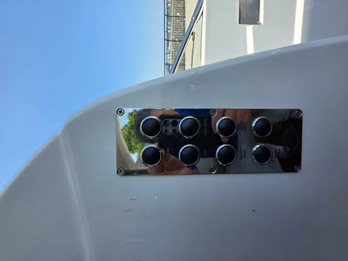  Yacht Photos Pics Control panel on a 2019 Sunseeker Predator 50 yacht, featuring multiple buttons.