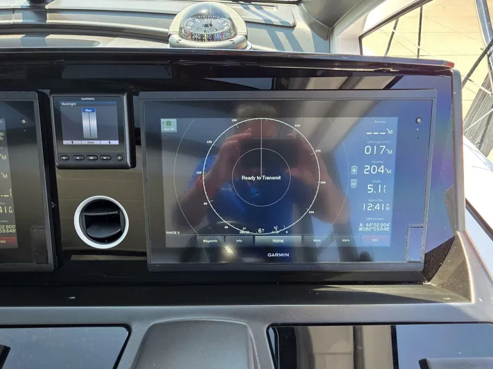  Yacht Photos Pics Dashboard of 2019 Sunseeker Predator 50 yacht with Garmin navigation display.