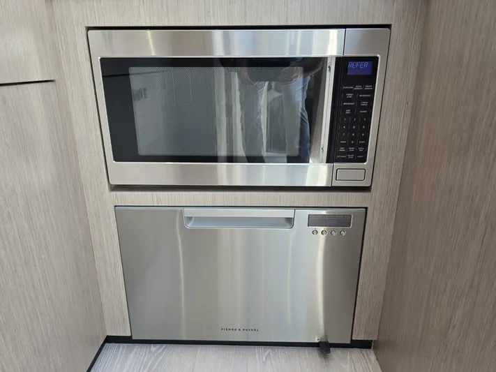  Yacht Photos Pics Built-in microwave and dishwasher in 2019 Sunseeker Predator 50 yacht kitchen.