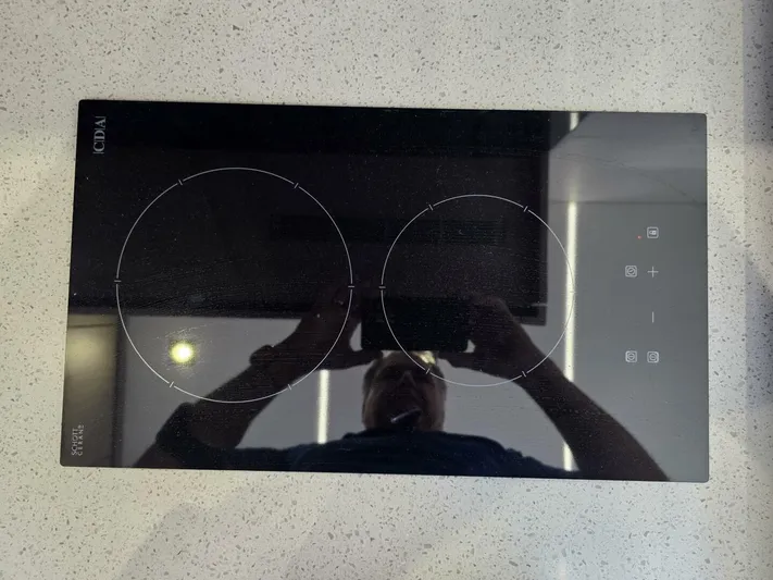  Yacht Photos Pics Modern induction cooktop on a Sunseeker Predator 50 yacht, 2019 model.